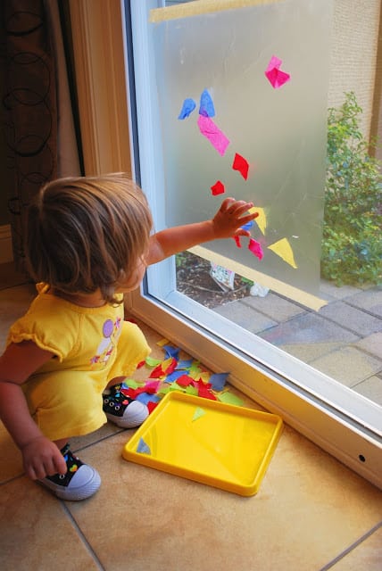 child making contact paper art