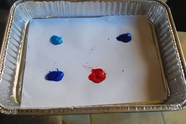 paint on paper in a tray