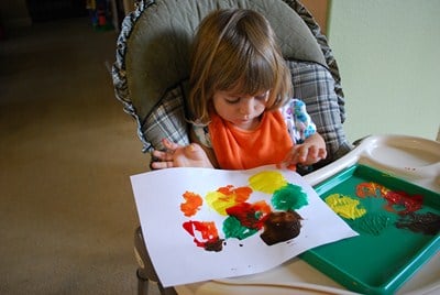 kids painting with fall colors