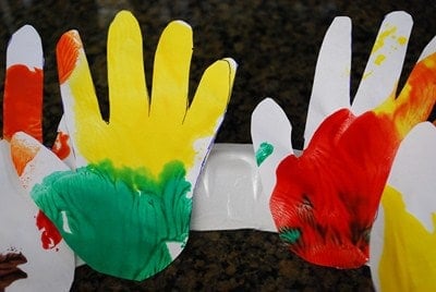 painted paper hands