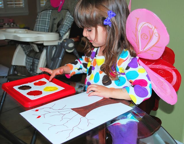 child making fall craft