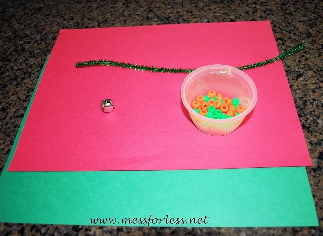 red and green construction paper and beads