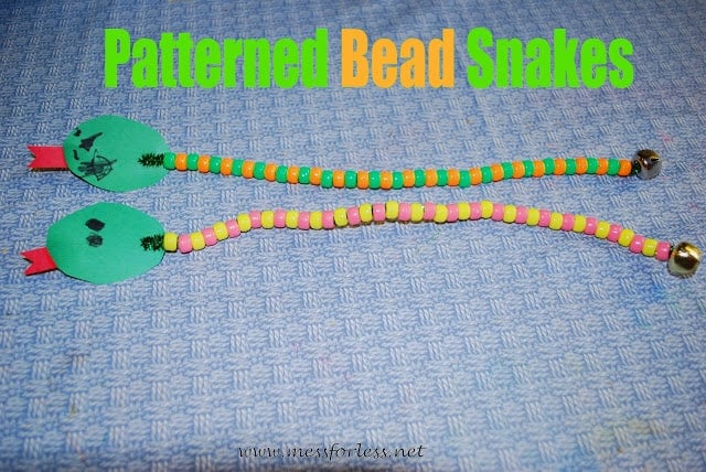 We had all the supplies we needed to make these patterned bead snakes at home. The kids only used two colors of beads to create a pattern.