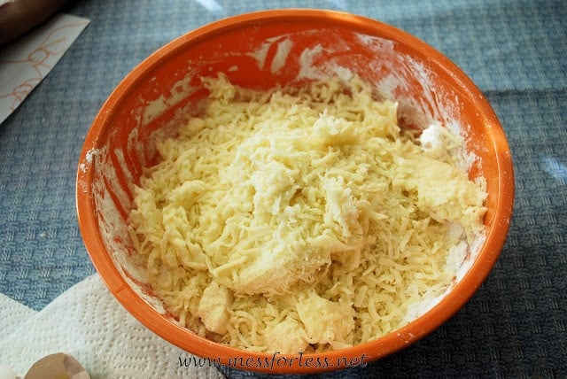 cheesy bread dough in bowl