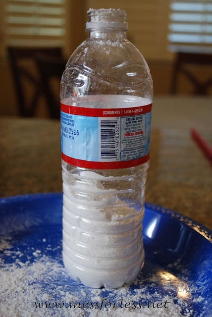water bottle filled with flour