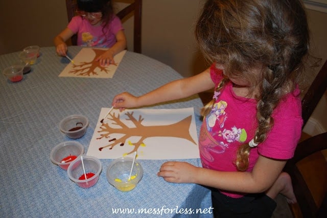 child painting with q-tips