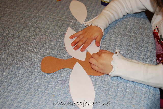 child making paper turkey
