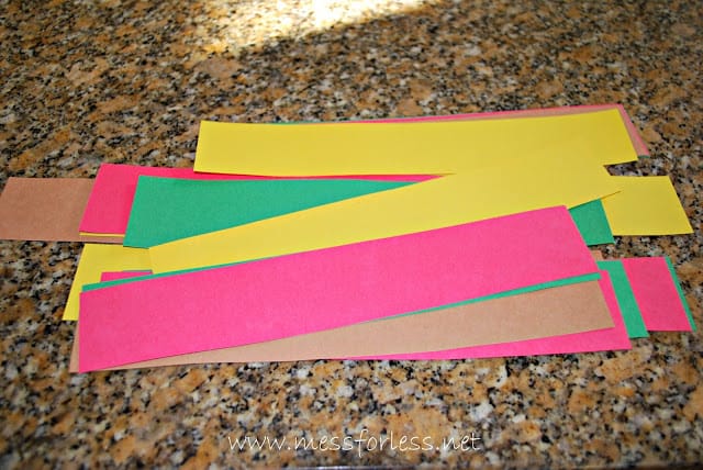 child making a woven paper placemat