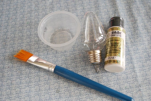 brush, glue and light bulb