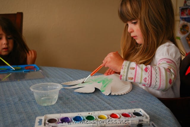 child painting paper plate