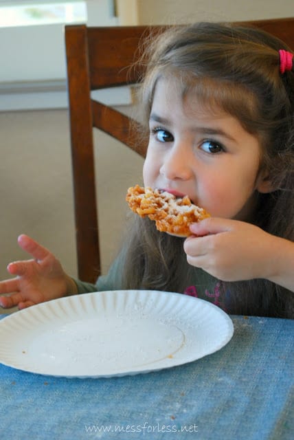 child eating funnel cake