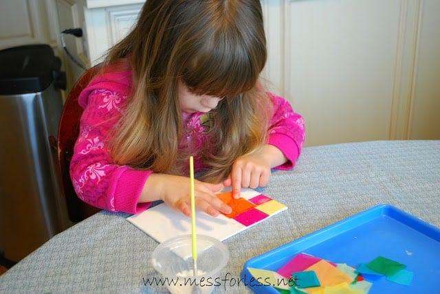 child glue tissue paper on canvas