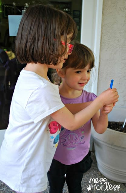 children with popsicle stick