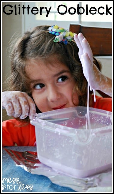 Glitter Oobleck Recipe - A few simple ingredients needed to make this fun slime that kids love to play with. A great sensory experience for little ones!