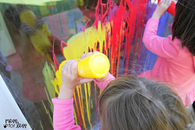 Painting a window with squirt bottles