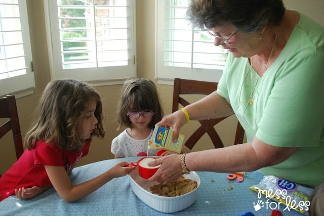 children cooking with grandma