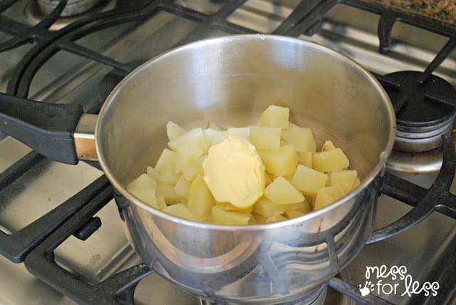 potatoes in a sauce pan with butter