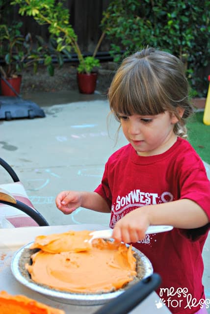 Scented Shaving Cream Pumpkin Pie - This fall sensory activity allows kids to create a play pumpkin pie using sand and shaving cream.