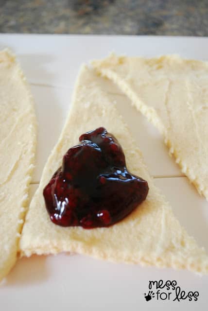 crescent roll dough with jam on it