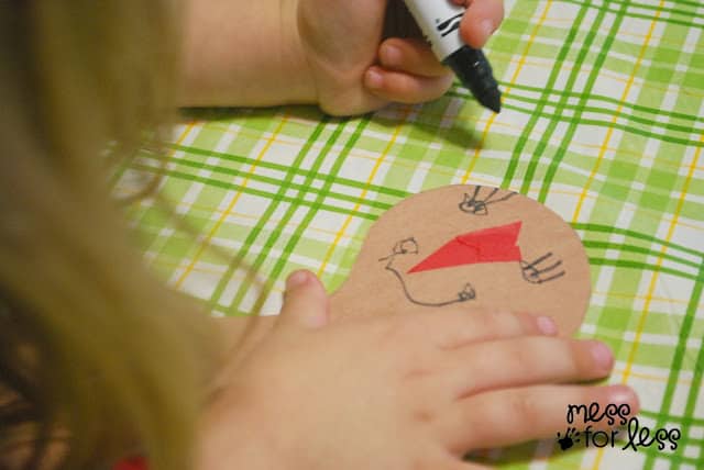 child drawing a turkey face