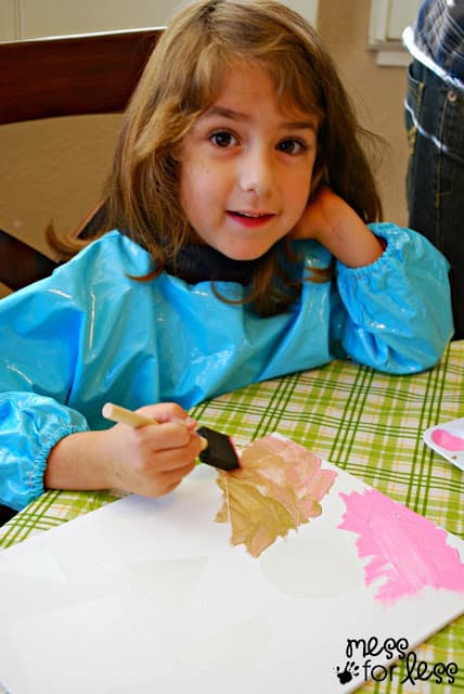 child painting canvas