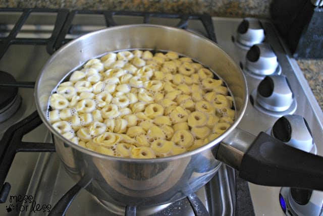 Tortellini cooking in a pot