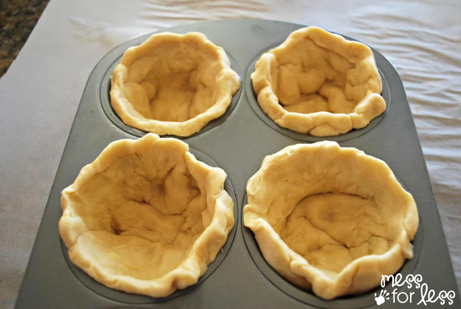 crescent roll muffin cups crescent dough in a muffin tin