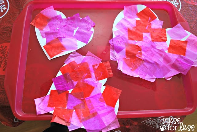 Decorating hearts with tissue paper
