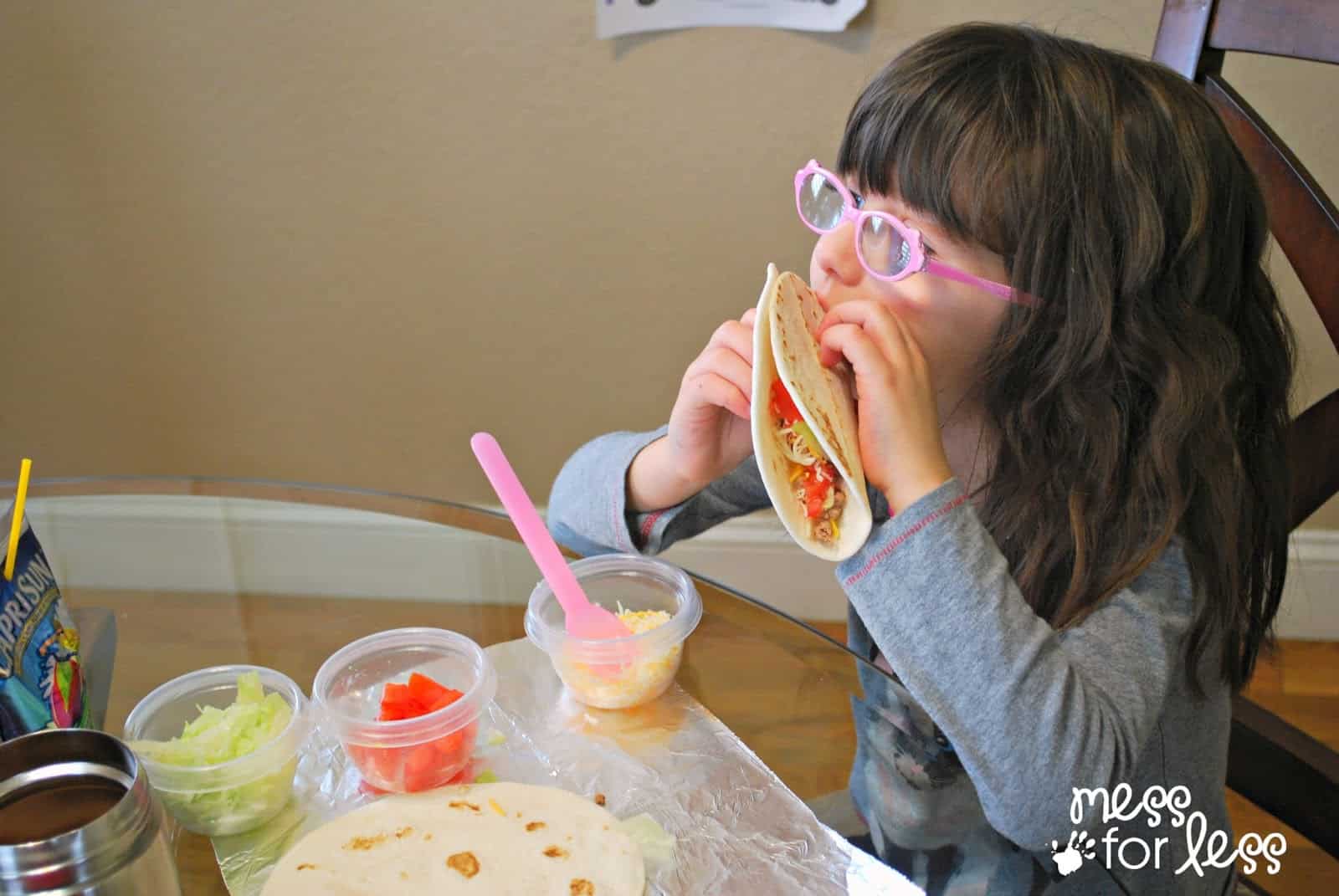 child eating a taco #ad