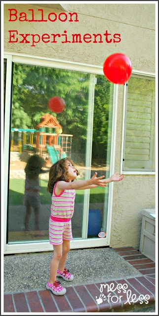 child playing with balloon