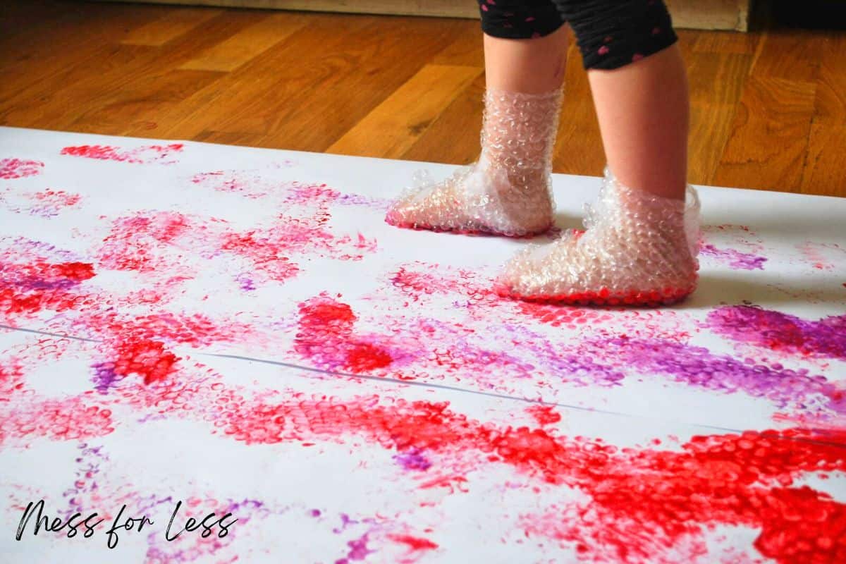 feet on paper with paint