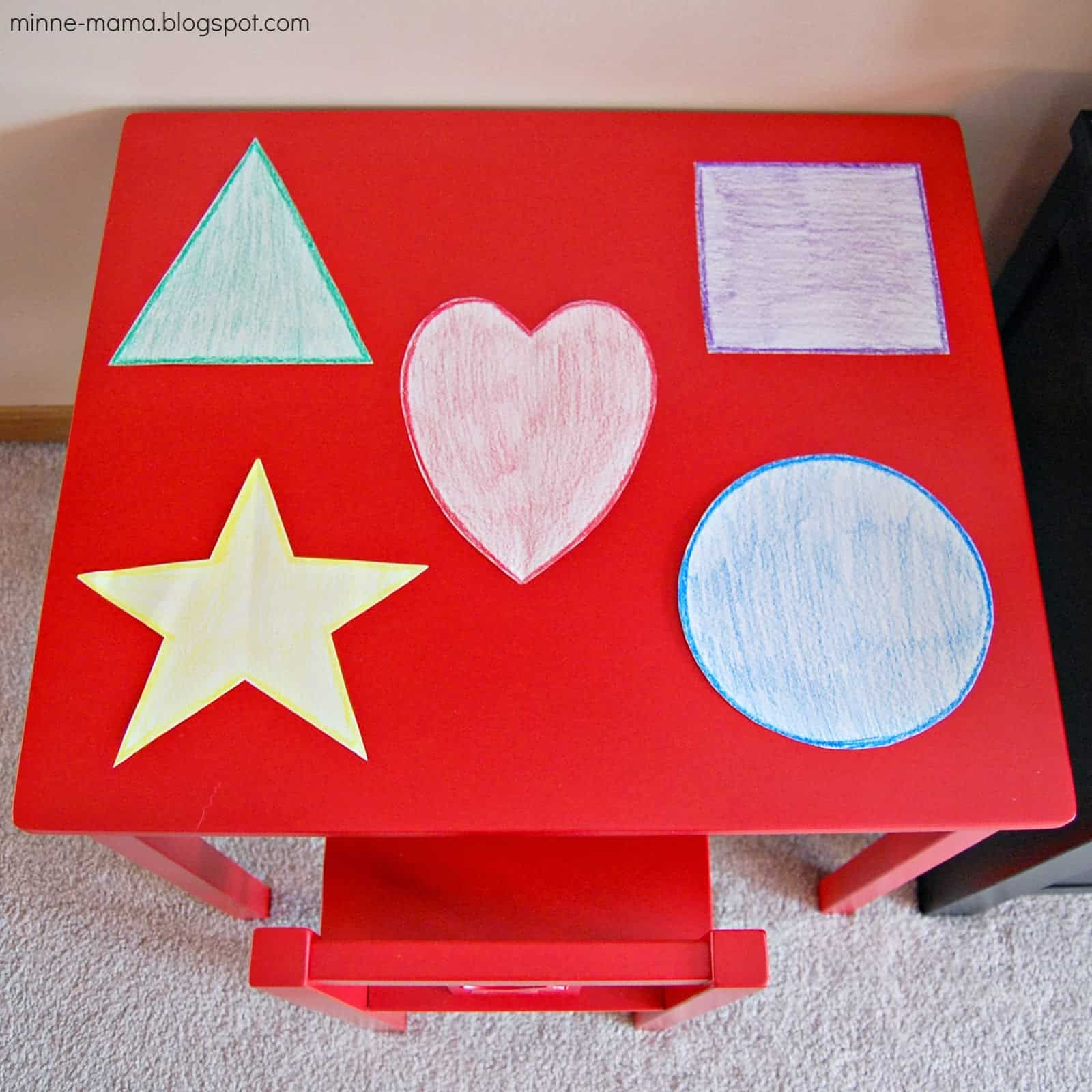 red table with shape pictures