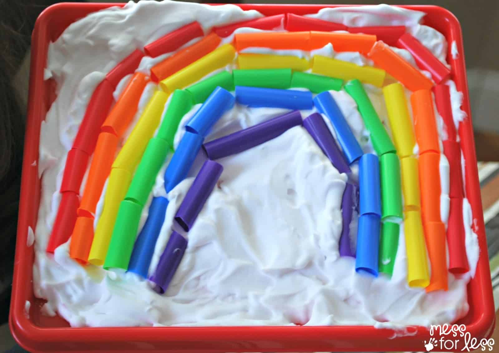 Making a sensory rainbow with straws