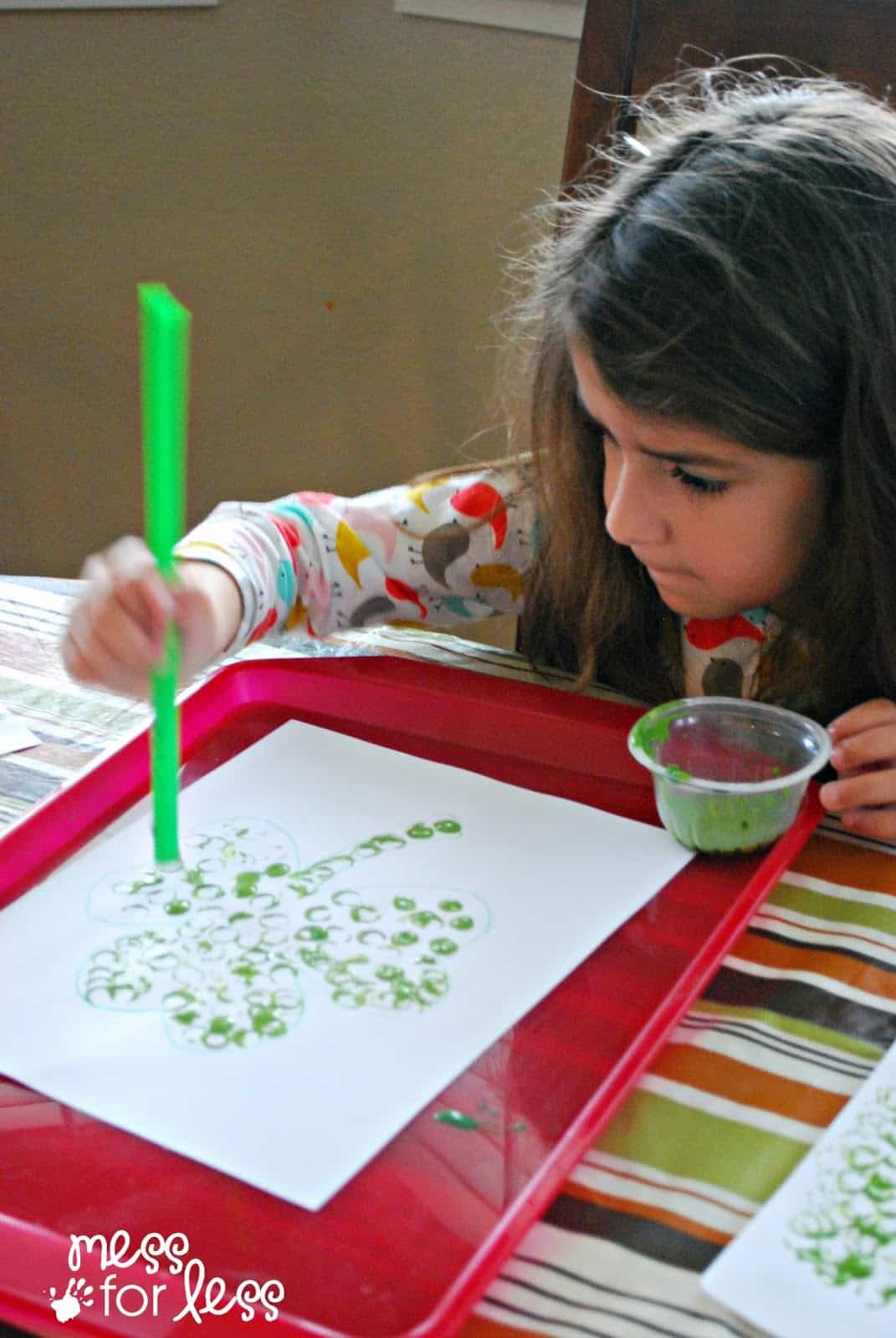 painting shamrock with straw