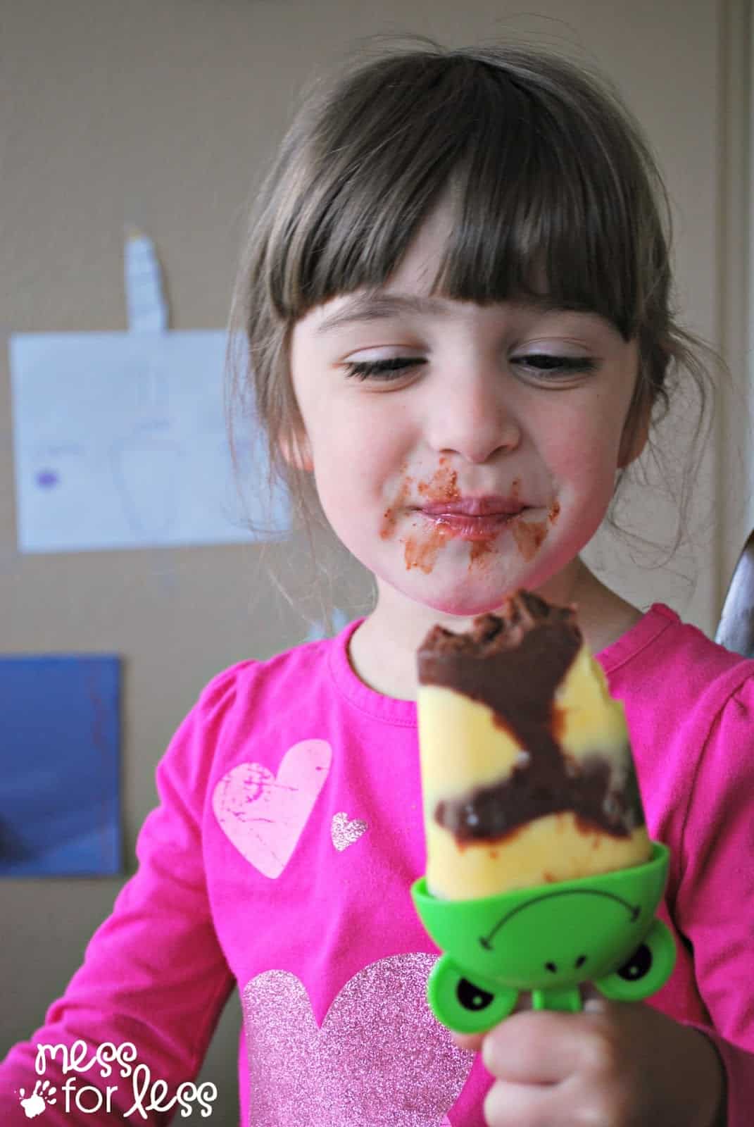 child eating pudding pop