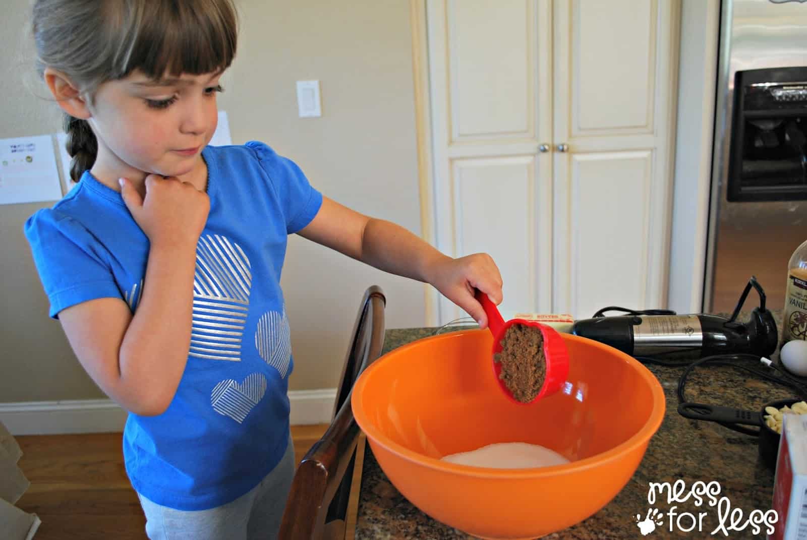 child helping to bake