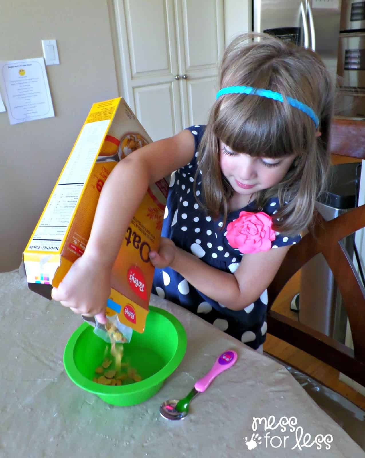 child pouring cereal