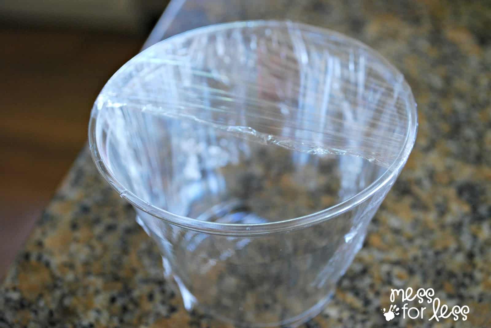 plastic cup with plastic wrap