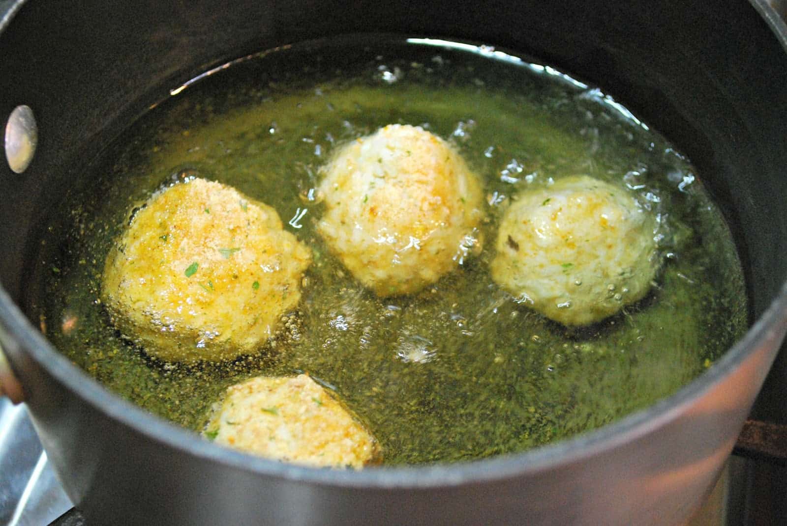 frying rice balls in oil