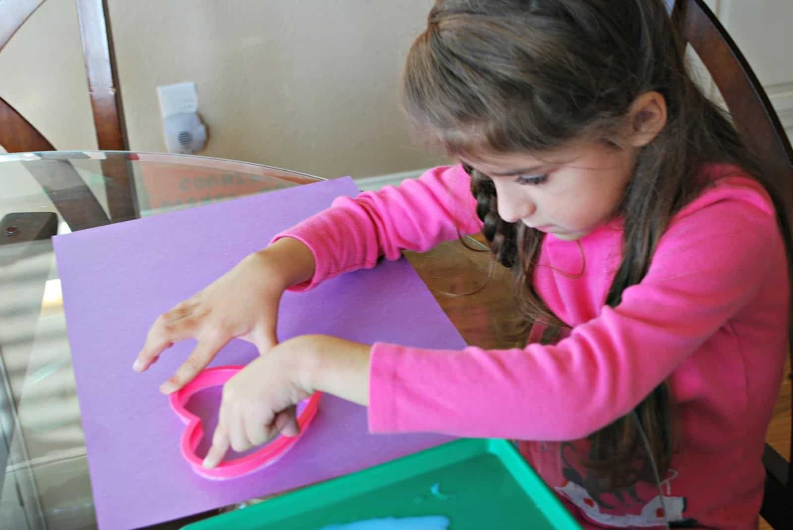 child making a valentine's craft