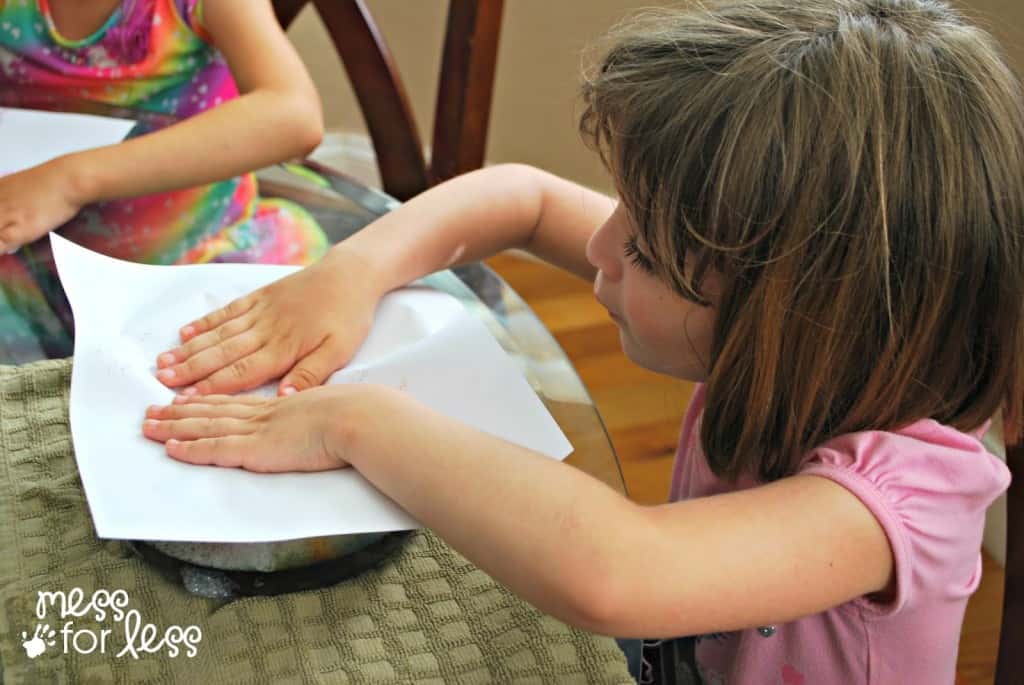 child making soap foam prints