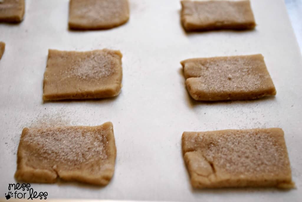 graham cracker squares on cookie sheet