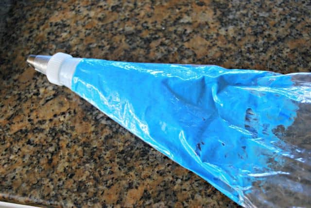 blue frosting in a piping bag
