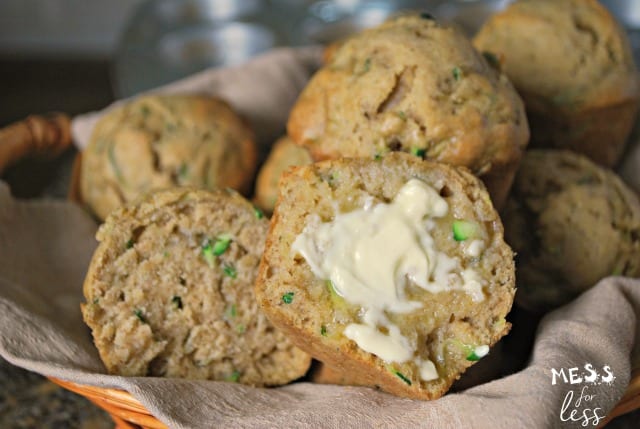 zucchini muffins sliced in half with butter