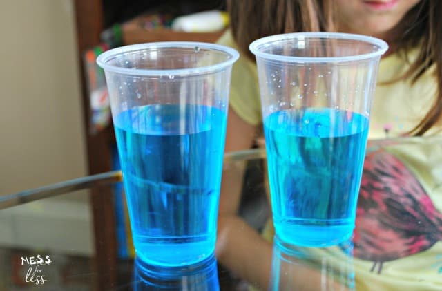 blue water in cups