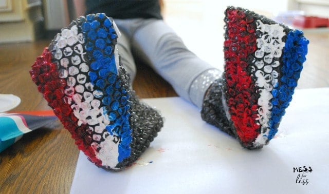 red, white and blue bubble wrap boots 