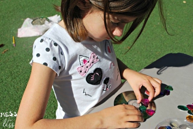 child making a suncatcher craft