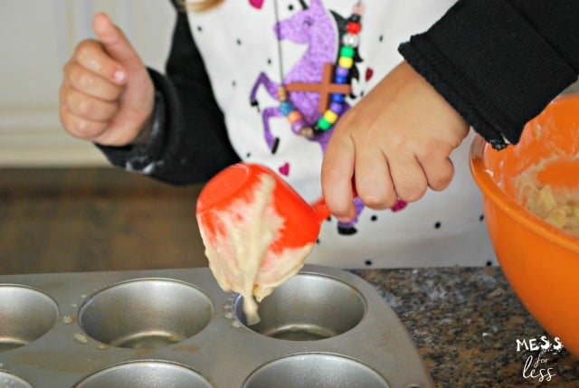 child making muffins