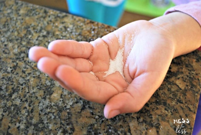 salt in a child's hand