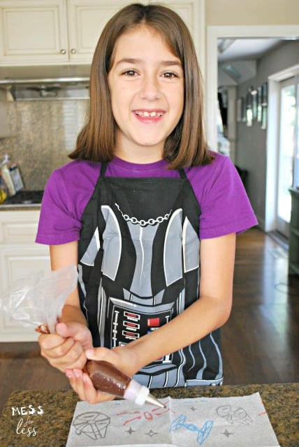 child cooking in kitchen